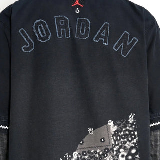 JORDAN X NOMARHYTHM TWISTED S/S JERSEY - BLACK / UNIVERSITY RED